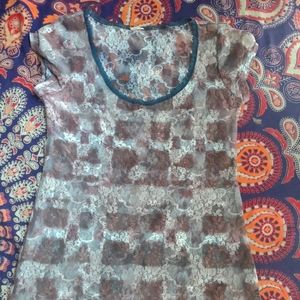 Cute white Lace top with brown pattern and blue lace neckline